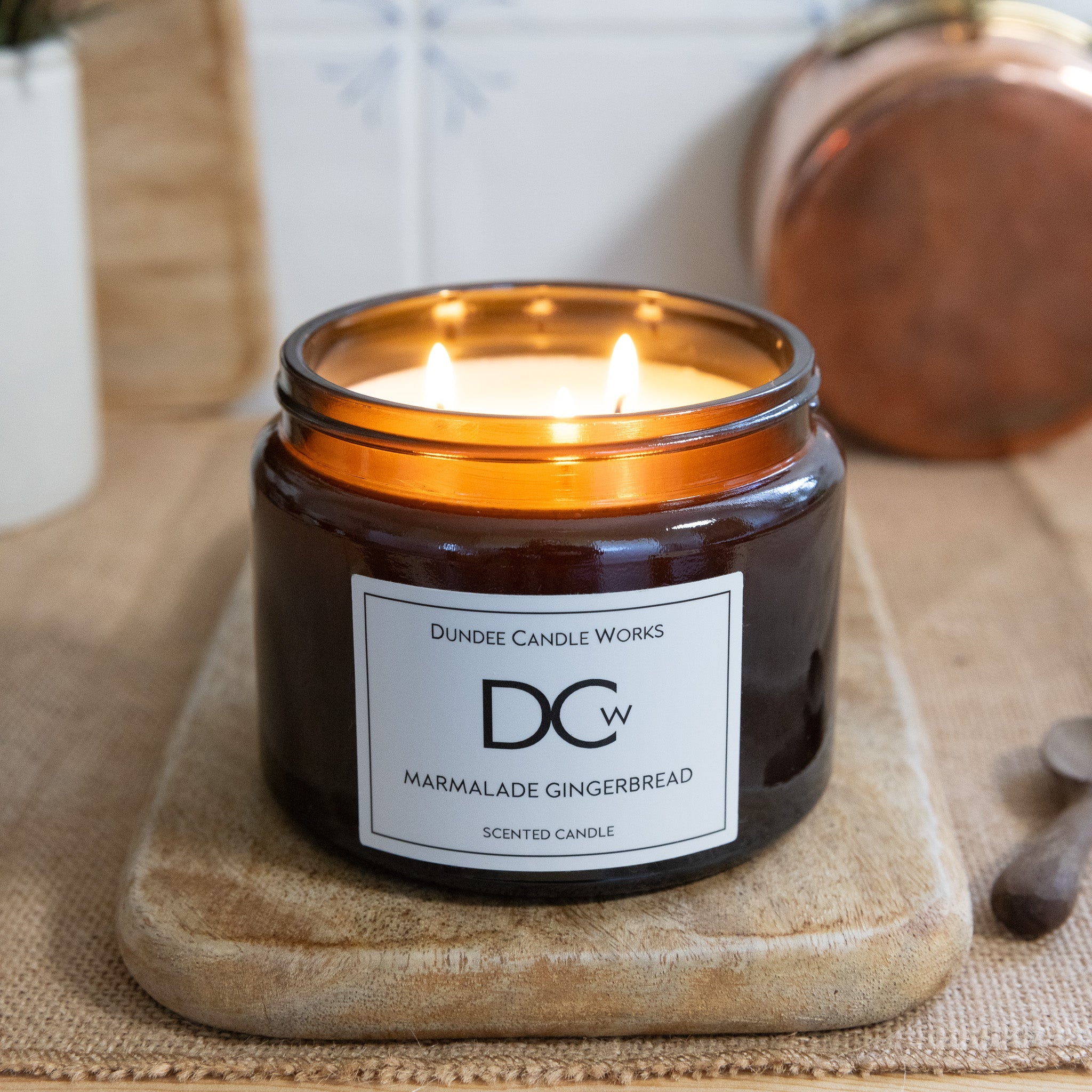Large triple wick Marmalade Gingerbread candle in a country kitchen setting