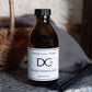 Dundee Candle Works large Whisky Marmalade Diffuser beside a wicker basket.