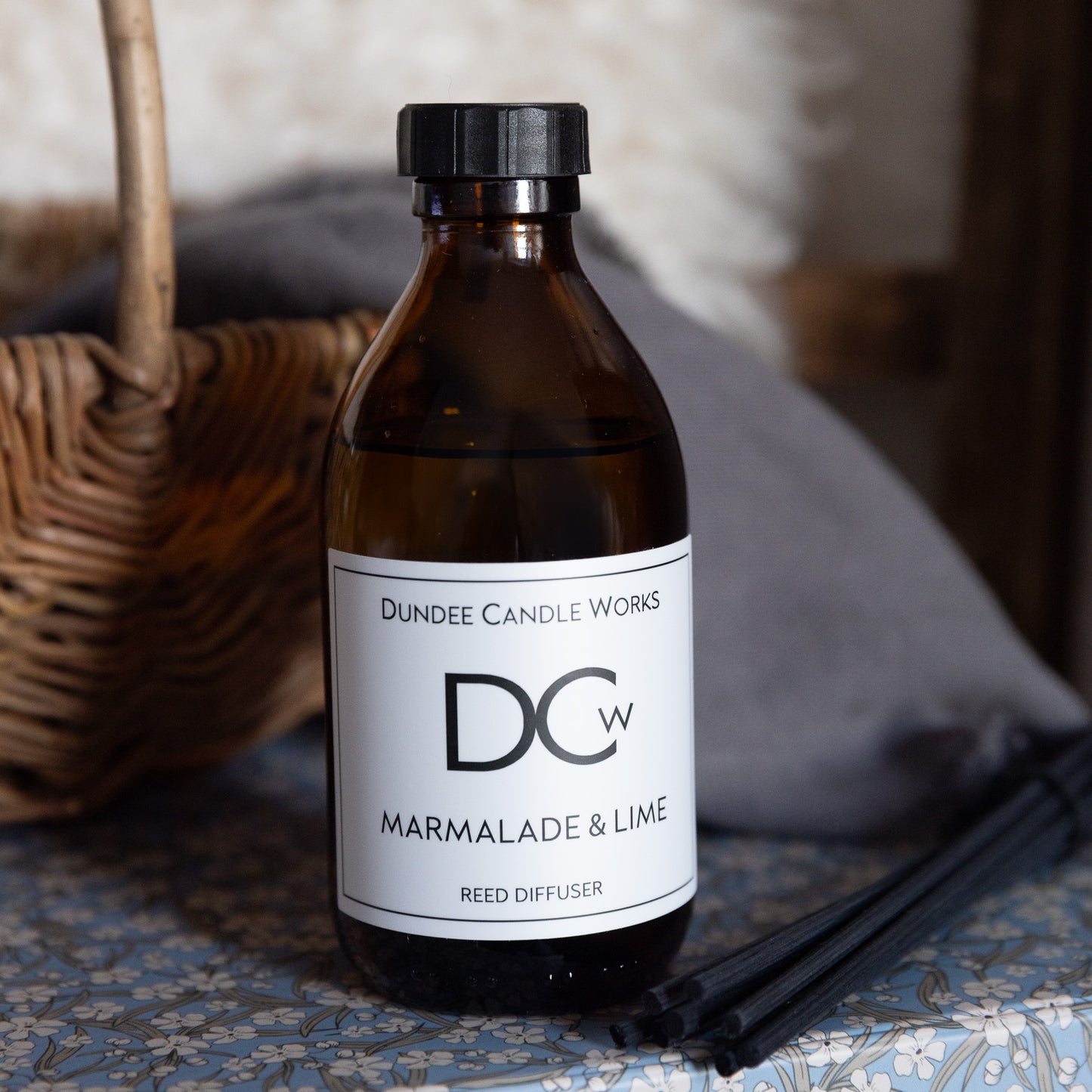 Marmalade & Lime reed diffuser placed in a calm, welcoming room.
