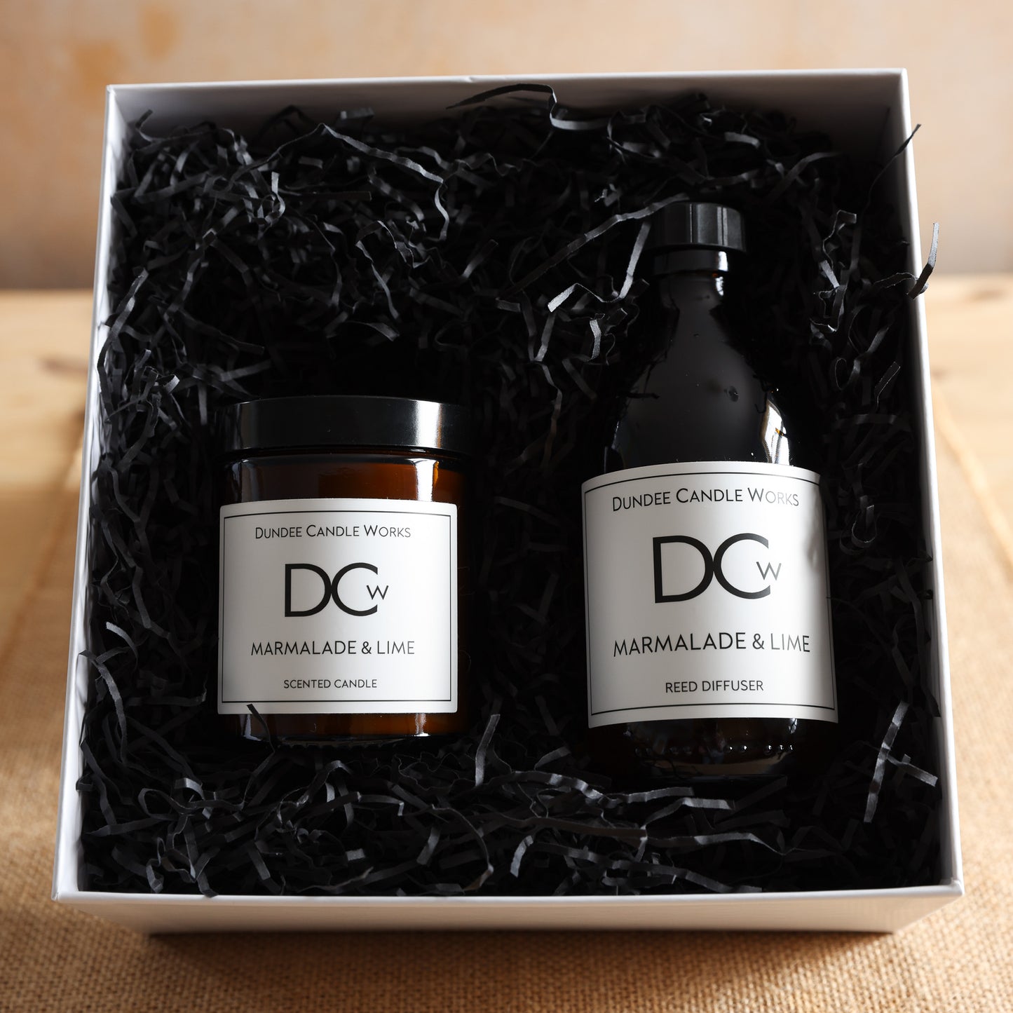 Marmalade & Lime candle and diffuser displayed in eco-friendly gift packaging.